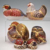 Lot 142 - Six Royal Crown Derby paperweights.