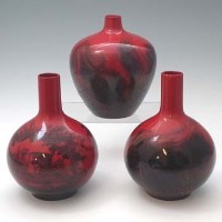 Lot 164 - Three Royal Doulton flambe vases.