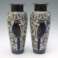 Lot 167 - Pair of Doulton Faience vases by Harry Simeon