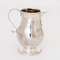 Lot 229 - Silver cream jug.