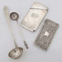 Lot 250 - Two silver card cases and two silver spoons.