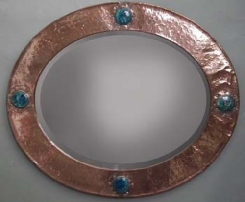 Lot 13 - Arts and crafts mirror with Ruskin panels.