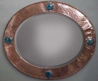 Lot 13 - Arts and crafts mirror with Ruskin panels.