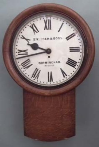 Lot 25 - Victorian oak drop dial wall clock