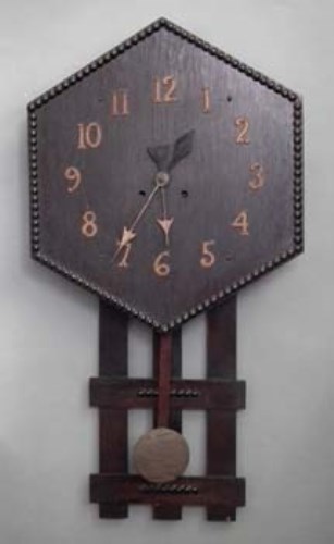 Lot 26 - Dark oak wall clock.