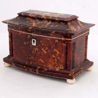 Lot 54 - Tortoiseshell bow-fronted tea caddy, early 19th