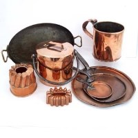 Lot 59 - Three copper saucepan lids, two jelly moulds