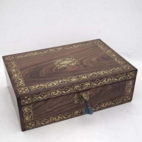 Lot 61 - Rosewood and foliate brass inlaid writing slope.