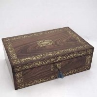 Lot 61 - Rosewood and foliate brass inlaid writing slope.