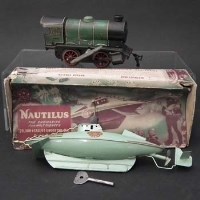 Lot 137 - Nautilus boxed submarine and a Hornby tin plate loco.