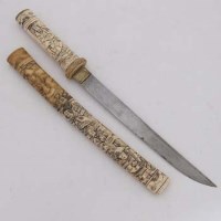 Lot 195 - Ivory cased dagger.
