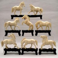 Lot 201 - Eight ivory horses.