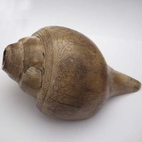 Lot 207 - Buddhist carved counch shell.