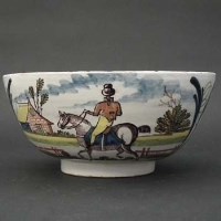 Lot 212 - Polychrome delfware bowl with equestrian scene.