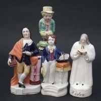 Lot 249 - Staffordshire Toby cruet, Wesley and two other figures.