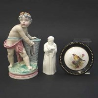 Lot 283 - Royal Worcester cherub, also a monk candle snuffer and a framed pot lid painted with a bird.