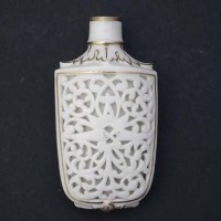 Lot 287 - Graingers Worcester reticulated scent bottle of shield shape.