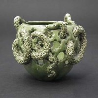 Lot 312 - Rye pottery snake vase.