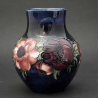 Lot 321 - Moorcroft anemone vase.