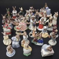 Lot 334 - Twenty seven Royal Doulton Bunnykins figures and one Royal Albert Beatrix Potter figure of Cotton tail