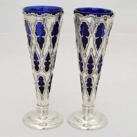 Lot 358 - Pair silver and blue glass trumpet vases.