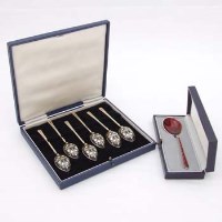 Lot 359 - Set of six silver gilt and enamel coffee spoons and a Danish enamel spoon.