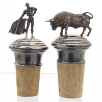 Lot 372 - Spanish matador and bull bottle stoppers.