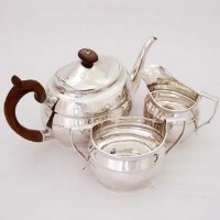 Lot 400 - Silver tea set.