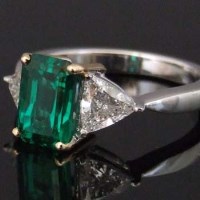 Lot 413 - Emerald and diamond ring with IGI certificate
