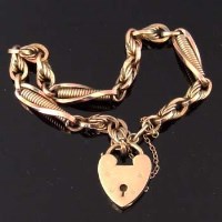 Lot 420 - 9ct gold fancy link bracelet with a padlock