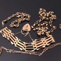 Lot 438 - 9ct Gold gate bracelet and three chains