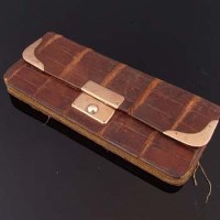 Lot 467 - Gold mounted crocodile skin purse.
