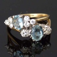 Lot 514 - Two 18ct aquamarine and diamond rings