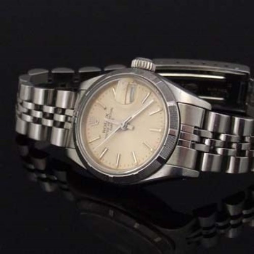 Lot 525 - Rolex lady's oyster perpetual wrist watch, boxed.