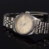 Lot 525 - Rolex lady's oyster perpetual wrist watch, boxed.