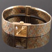 Lot 533 - Beuche Girod 9ct lady's bracelet watch.
