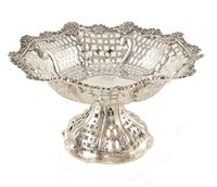 Lot 8 - Pierced silver floral dish on pedestal foot by Charles Stuart Harris, London, 1890, weight approximately 16.35ozt.