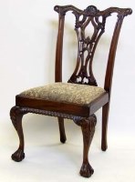 Lot 897 - Twenty Chippendale style dining chairs.