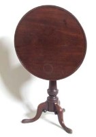 Lot 915 - George III mahogany tip-top table