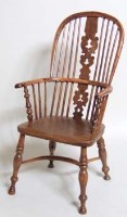 Lot 927 - Yew wood high bow-backed Windsor chair