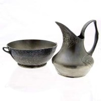 Lot 26 - Orivit pewter jug and bowl.