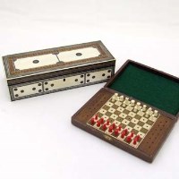 Lot 32 - Cribbage box and a travelling chess set.