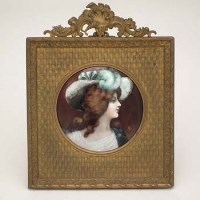 Lot 39 - Enamelled miniature of a lady.