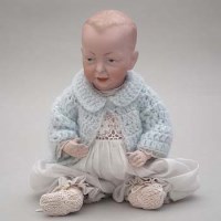 Lot 77 - K and R character baby doll.