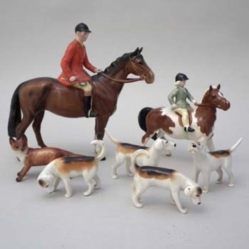 Lot 238 - Beswick huntset including girl on pony.
