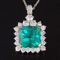 Lot 290 - Colombian emerald and diamond pendant, with