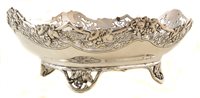 Lot 14 - A silver dish, grape vine decoration to edge, marks for Harry Atkin, Sheffield 1929.