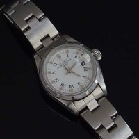Lot 394 - Lady's stainless Rolex oyster perpetual date wristwatch boxed with papers and spare link.