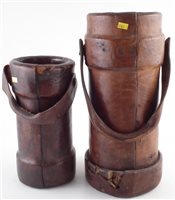 Lot 20 - Two Leather Shell Carriers.