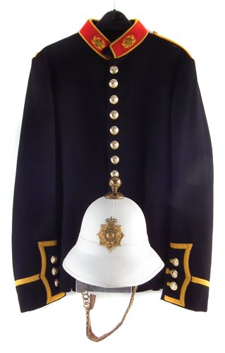Lot 109 - Royal Marines bandsman's tunic and a pith helmet.